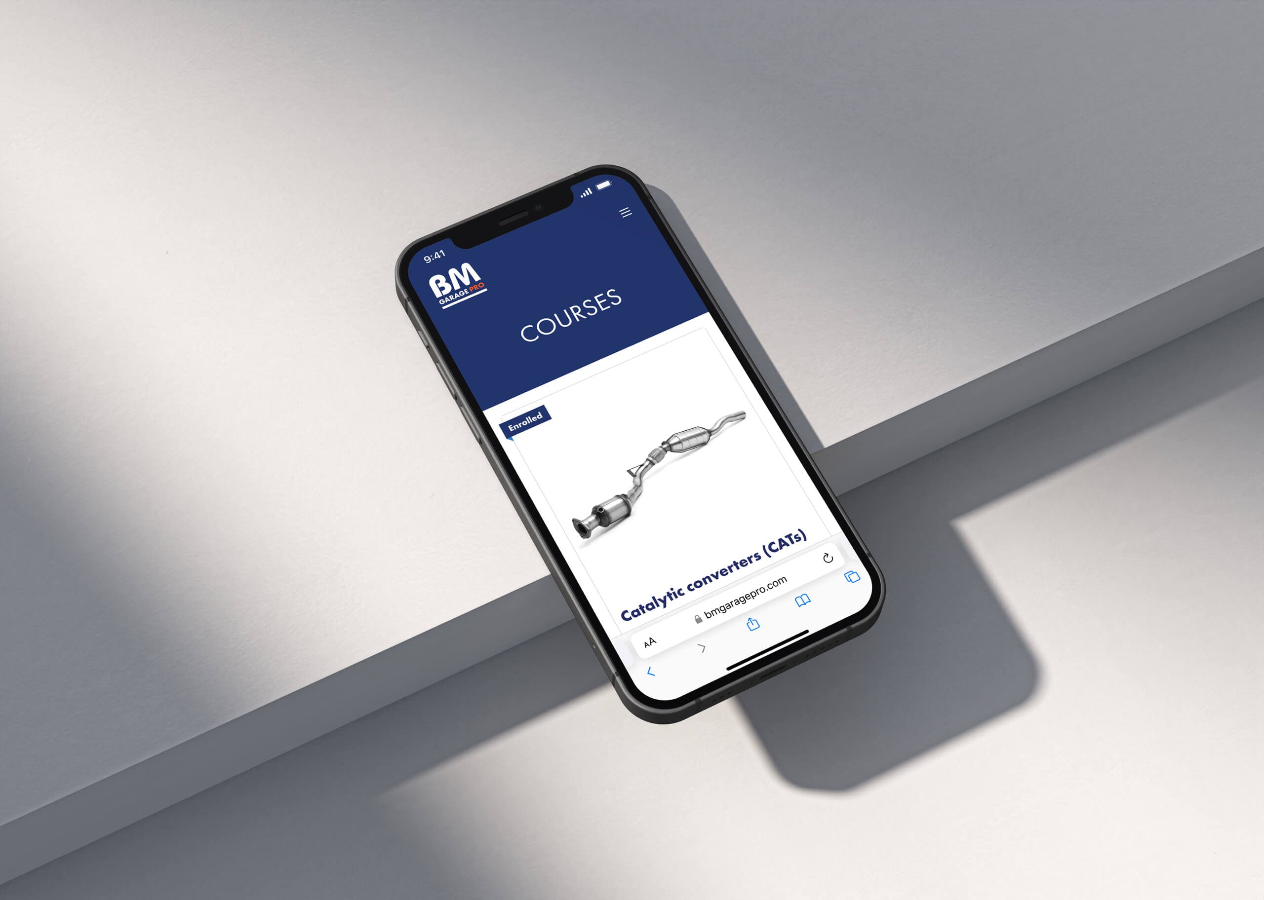 BM Garage Pro phone mockup with course interface